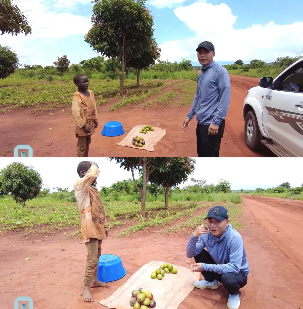  Cậu bé bán hoa quả lề đường mà Quang Linh bắt gặp. (Ảnh: Chụp màn hình YouTube Quang Linh Vlogs)